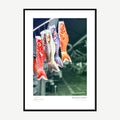 Framed print: colourful Japanese carp streamers against a grey sky, black wood frame