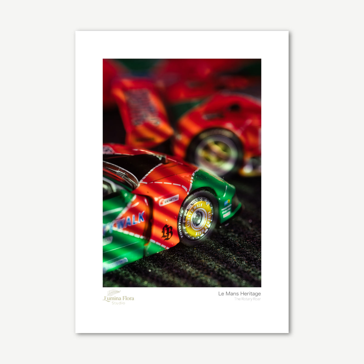 Unframed print: miniature rotary race car with smoke, white gallery border
