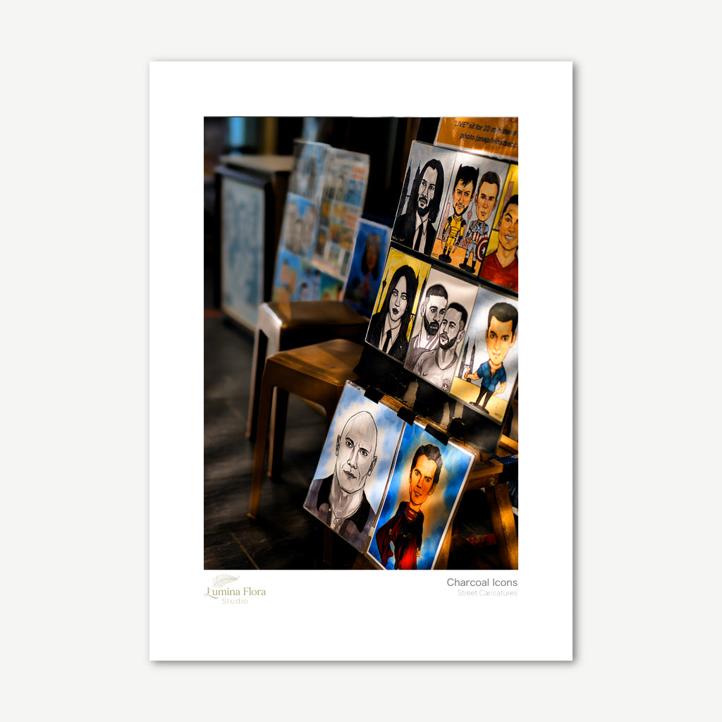 Unframed print: charcoal caricatures on street easels, white gallery border
