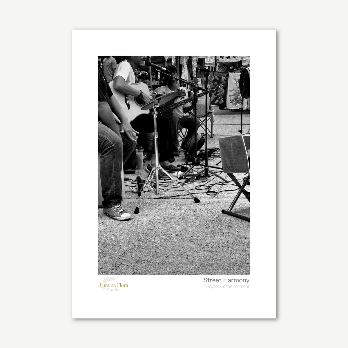 Unframed print: black and white street musicians, white gallery border