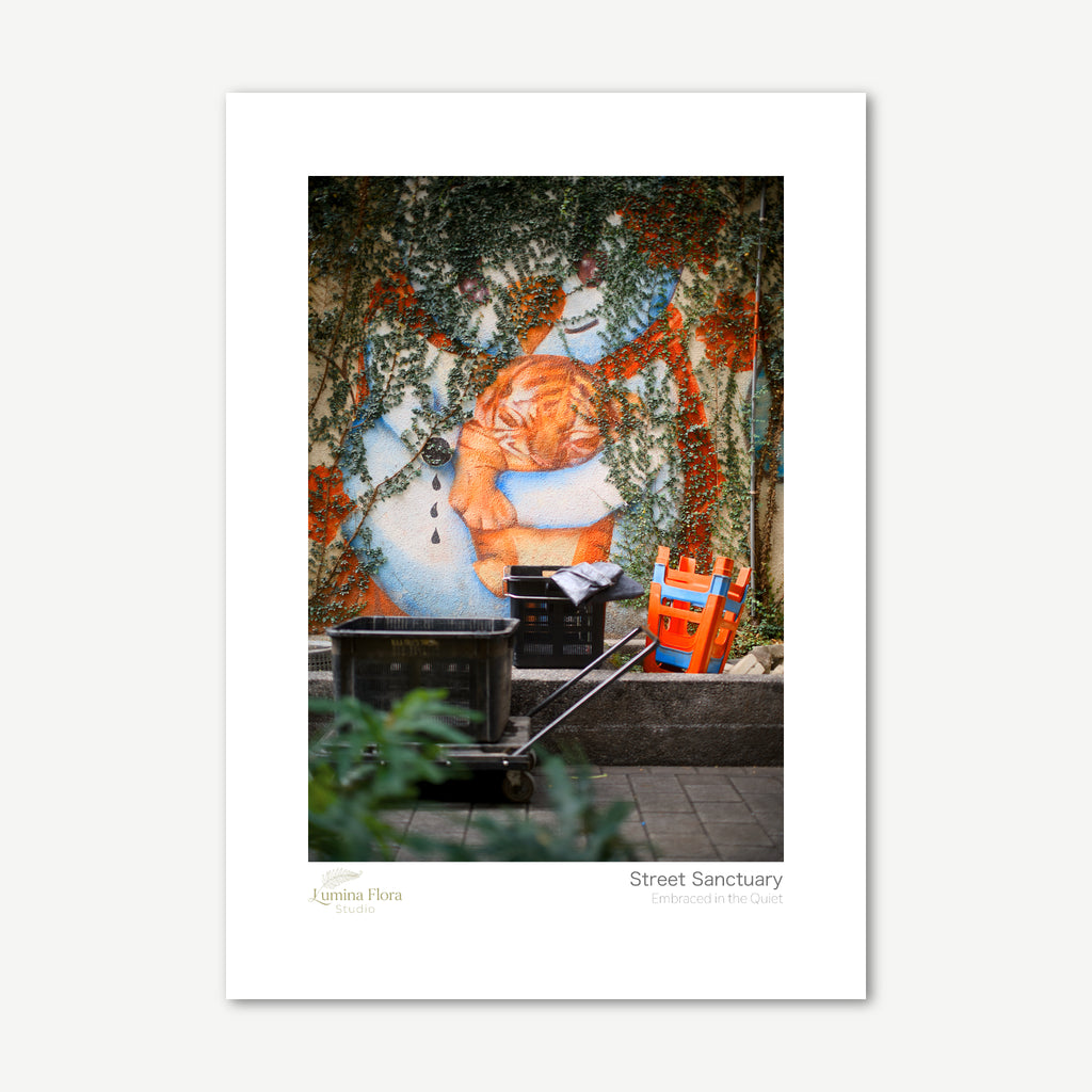 Unframed print: alley mural of a figure holding a tiger cub, white gallery border