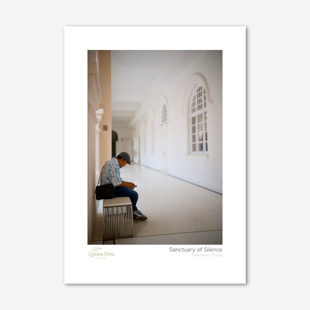 Unframed print: lone person in a white arched hallway, white gallery border